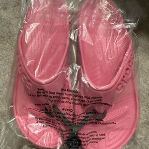 Brand new croc flip flops